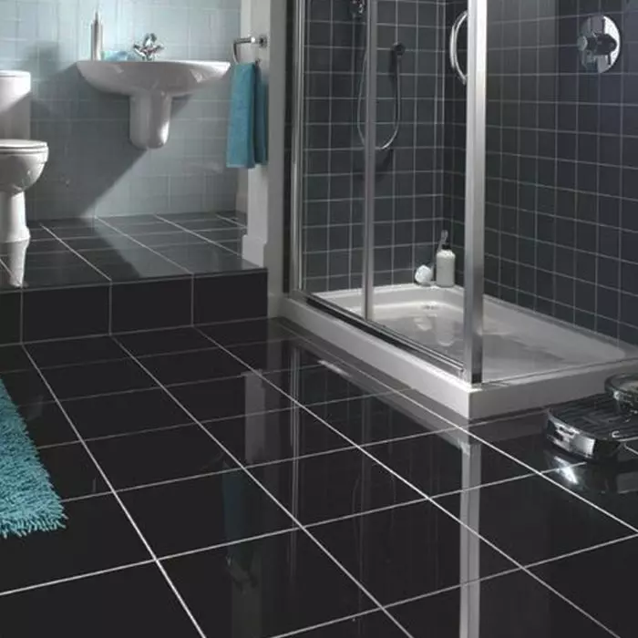 Super Black polished porcelain tiles installed in a modern interior